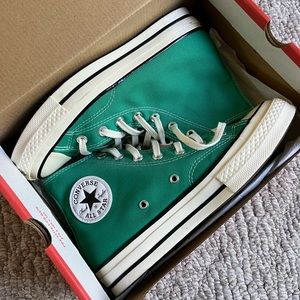Court green high top converse in womens size 6.5